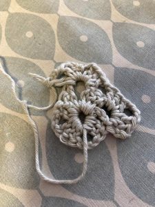Workshop - showing crochet piece on table